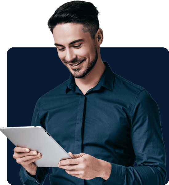 Business owner reviewing leadership coaching strategy on tablet